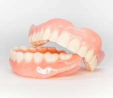 Complete set of dentures on a white background