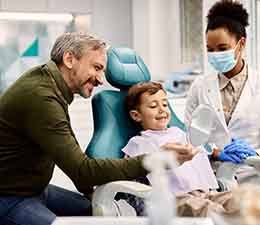 Boy smiling at the dentist