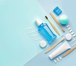 Oral hygiene tools set on a colored background