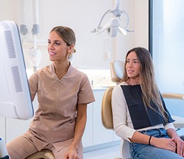 Woman smiling in the dental chair